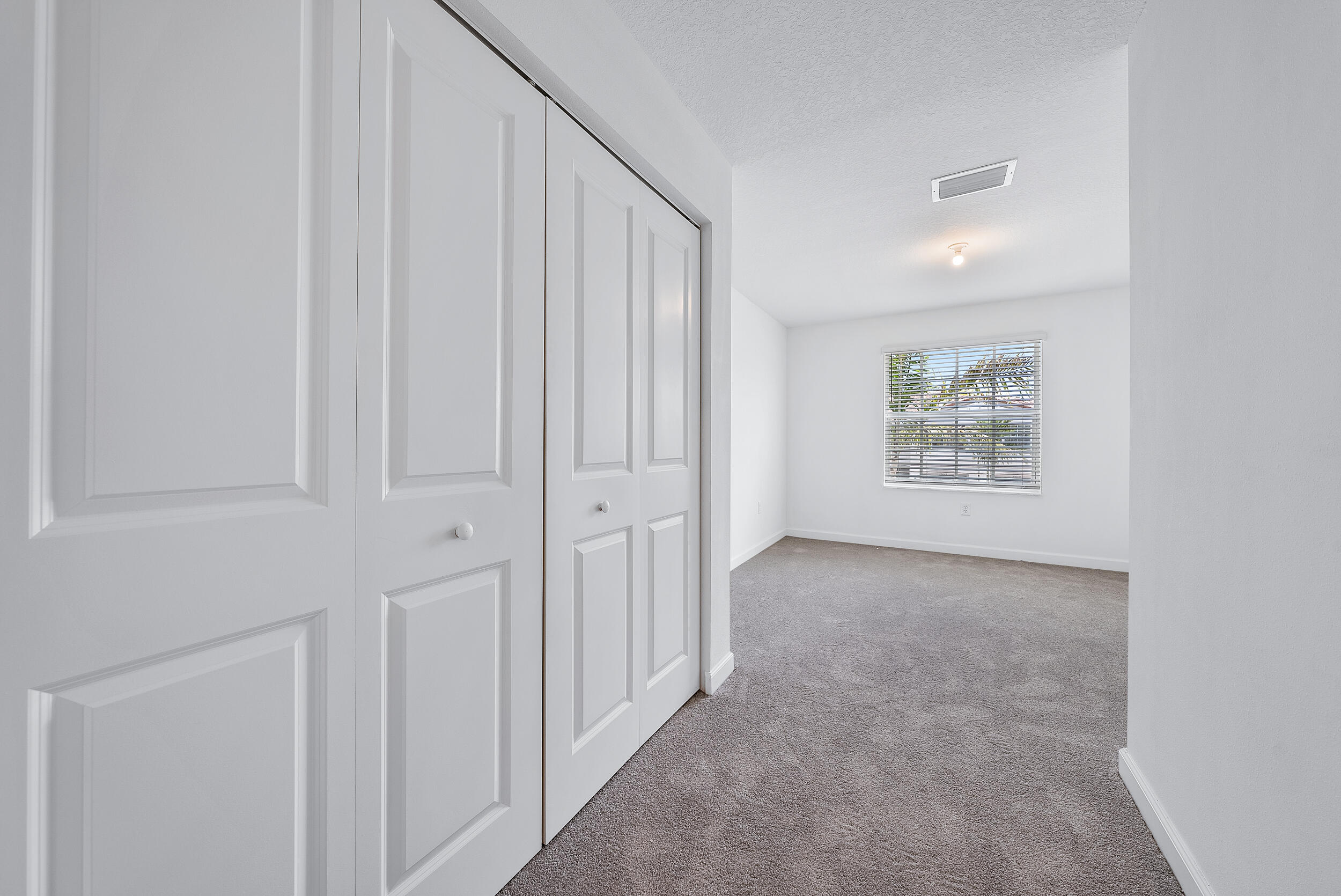 4215 Bent River Road Lake Worth, FL 33467 - Photo 24 of 29 a view of an empty room