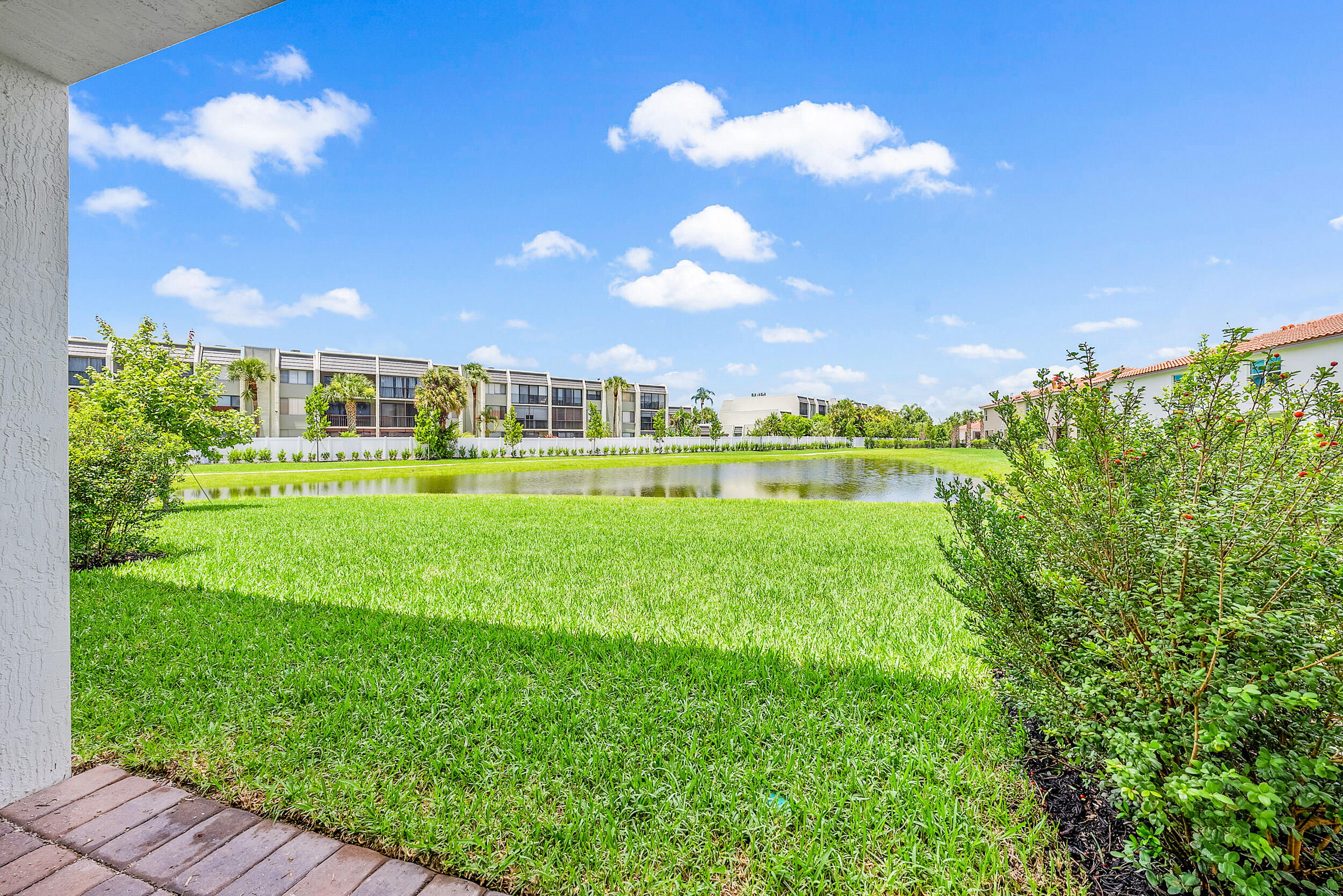 4215 Bent River Road Lake Worth, FL 33467 - Photo 27 of 29 a view of a big yard with swimming pool and green space