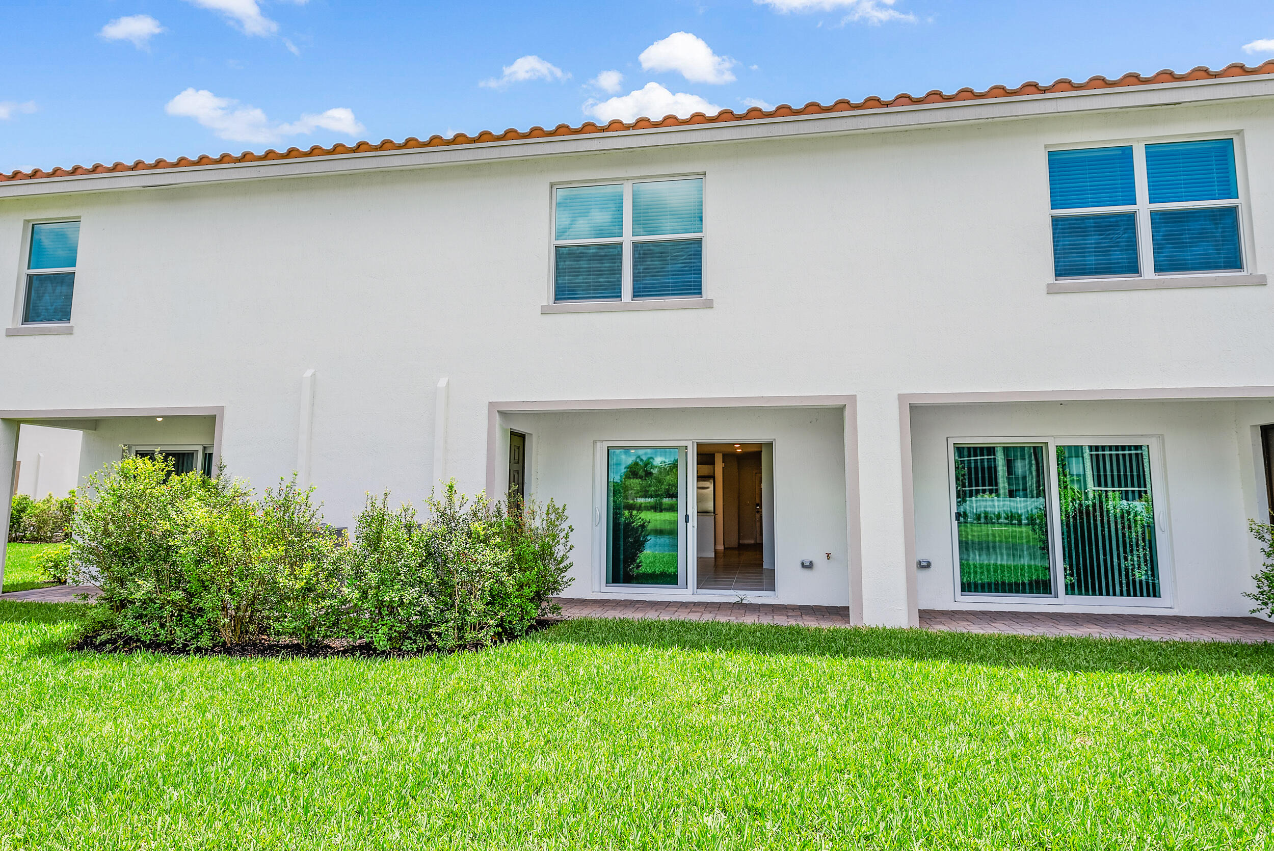 4215 Bent River Road Lake Worth, FL 33467 - Photo 28 of 29 a view of a house with backyard and garden