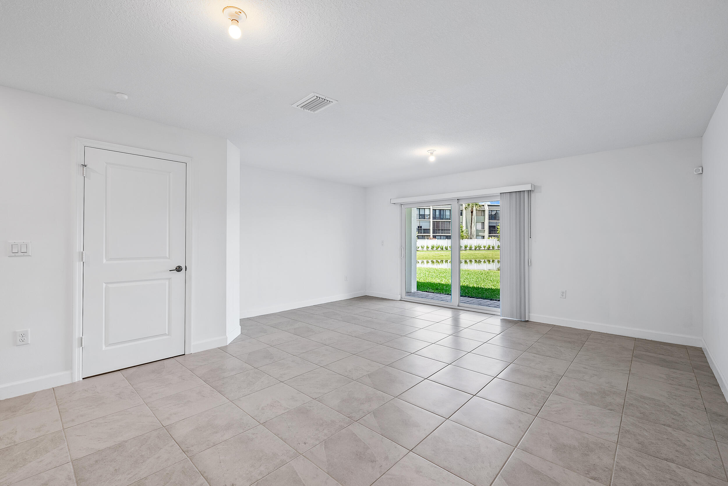 4215 Bent River Road Lake Worth, FL 33467 - Photo 10 of 29 a view of an empty room with a window