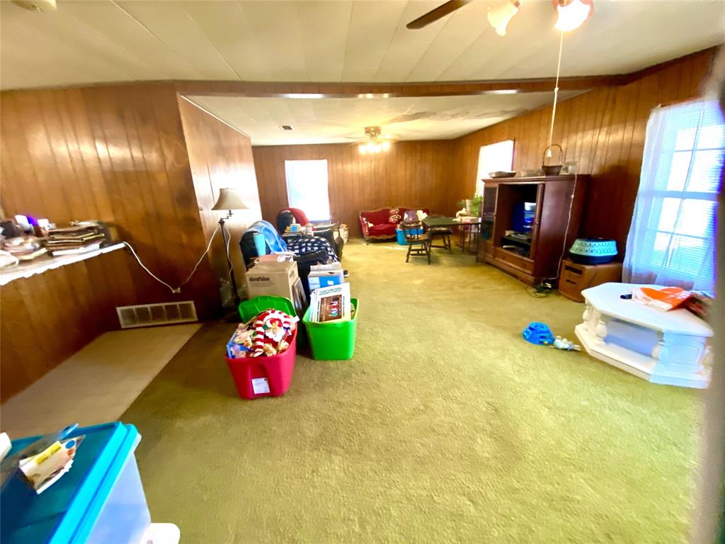 403 Mockingbird Street Chico, TX 76431 - Photo 4 of 25 a gym room with gym equipment