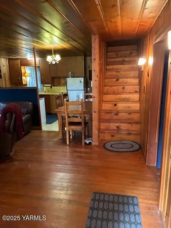 a view of livingroom with furniture and a fireplace