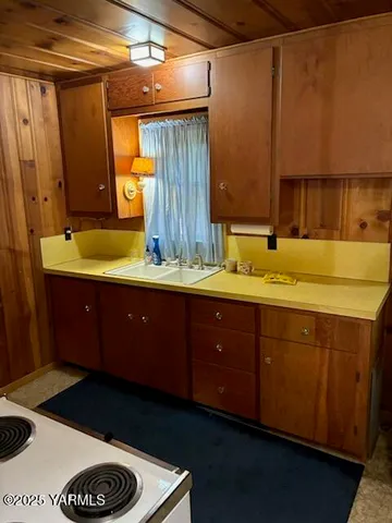 a bathroom with a sink and a shower