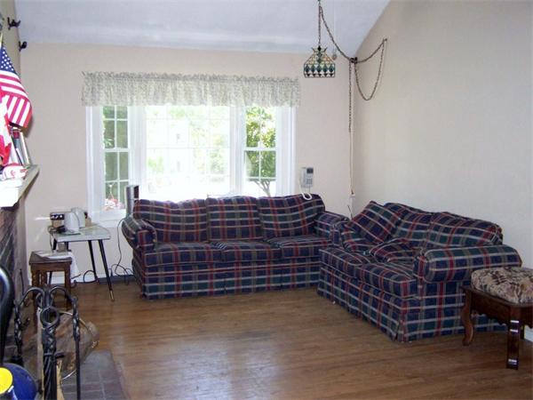 48 Signal Hill Road Marshfield, MA 02050 - Photo 6 of 11 a bedroom with a bed window and a table