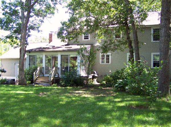 48 Signal Hill Road Marshfield, MA 02050 - Photo 9 of 11 a front view of a house with a garden
