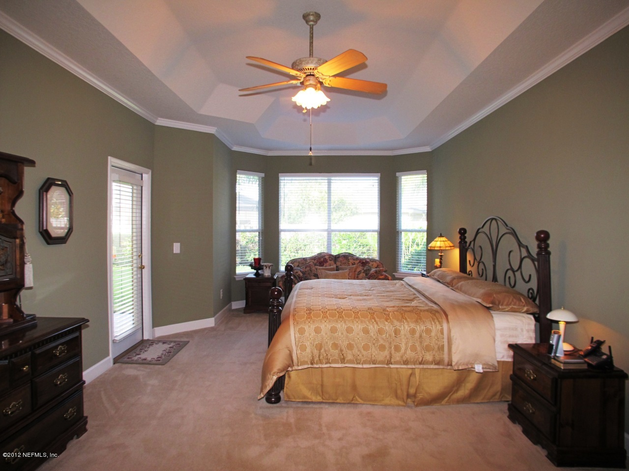 1645 Margarets Walk Road Fleming Island, FL 32003 - Photo 14 of 42 a bedroom with a bed and window