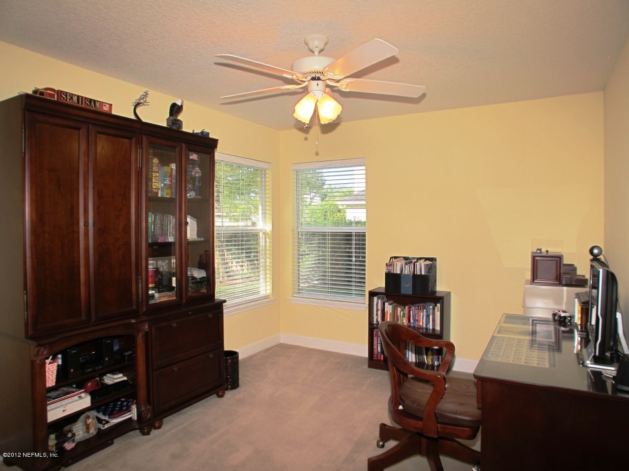 1645 Margarets Walk Road Fleming Island, FL 32003 - Photo 19 of 42 a workspace with furniture and window