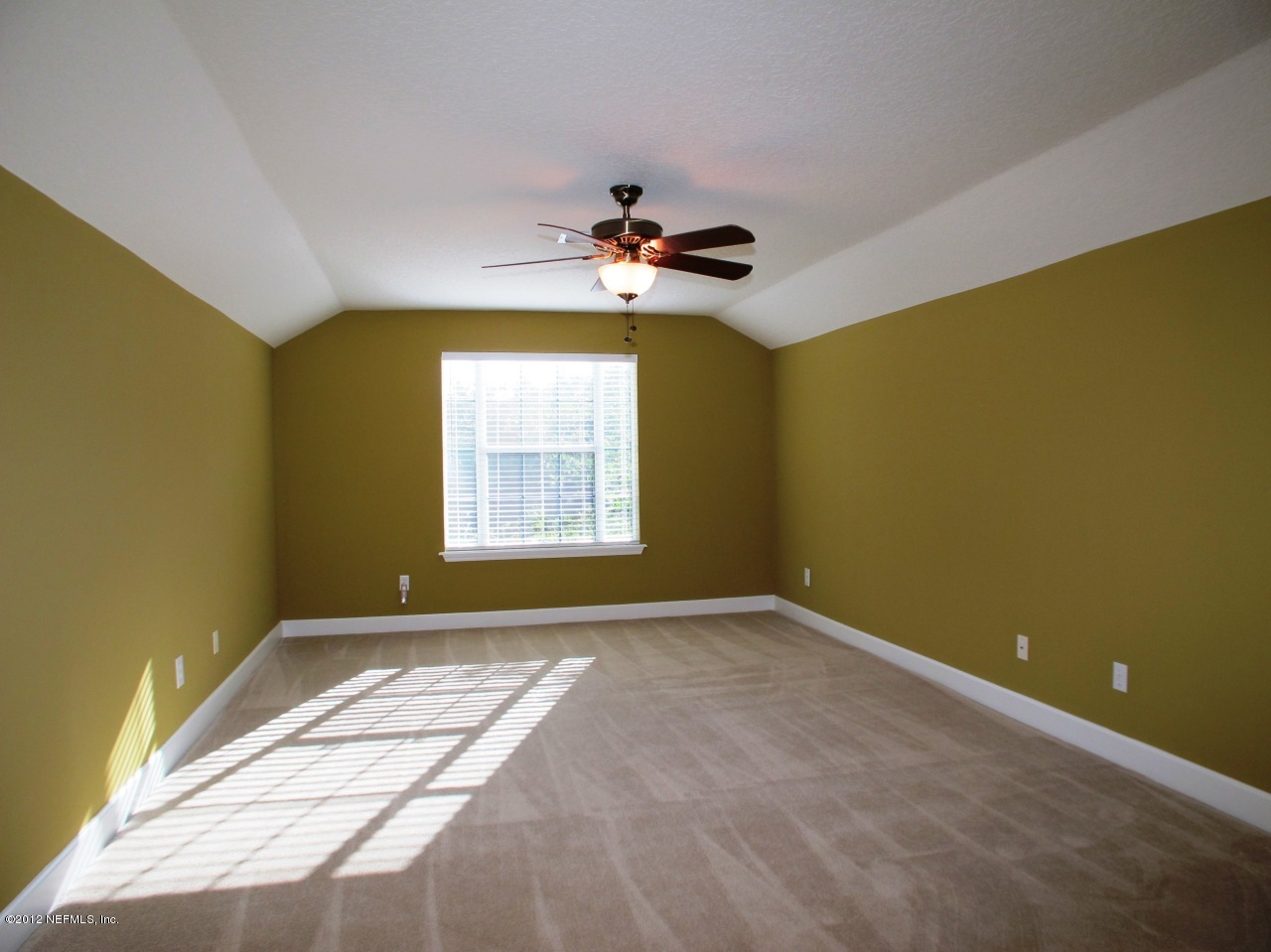 1645 Margarets Walk Road Fleming Island, FL 32003 - Photo 21 of 42 a view of an empty room with a window