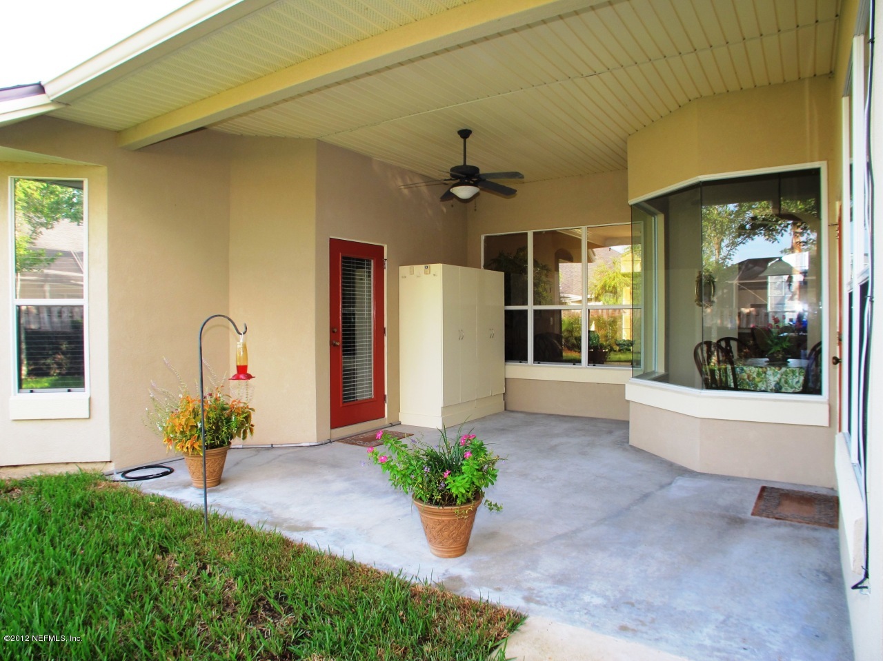 1645 Margarets Walk Road Fleming Island, FL 32003 - Photo 25 of 42 a view of a house with a yard