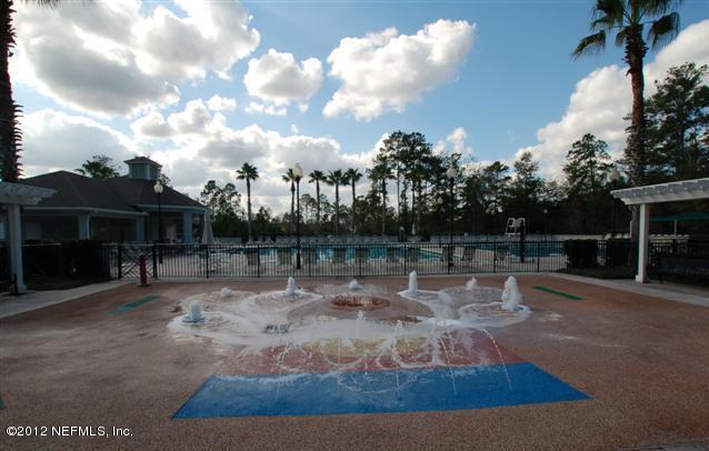 1645 Margarets Walk Road Fleming Island, FL 32003 - Photo 33 of 42 a backyard of a house with lots of green space