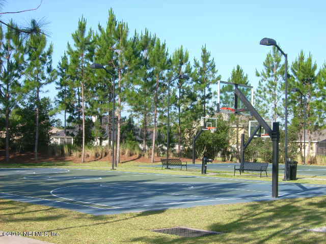 1645 Margarets Walk Road Fleming Island, FL 32003 - Photo 41 of 42 a building with trees in the background