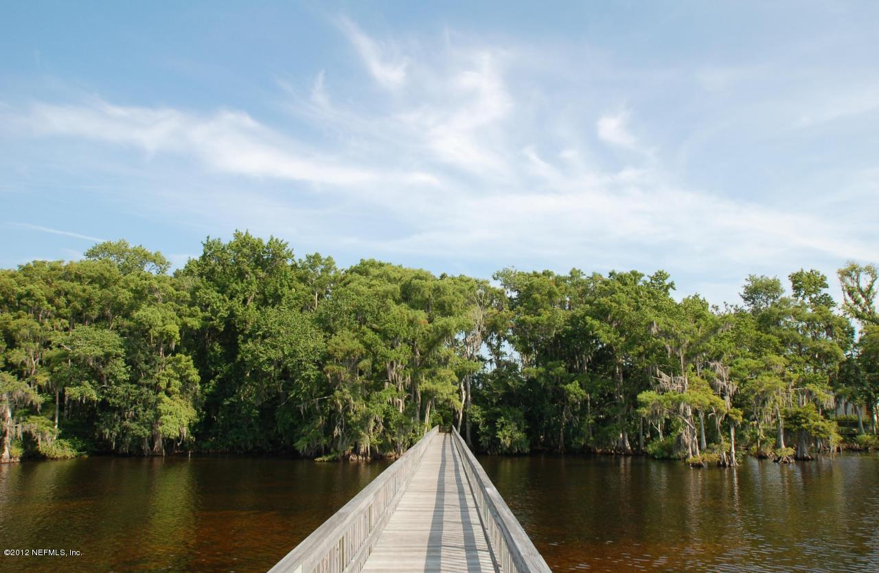 1645 Margarets Walk Road Fleming Island, FL 32003 - Photo 42 of 42 a view of a lake with a city