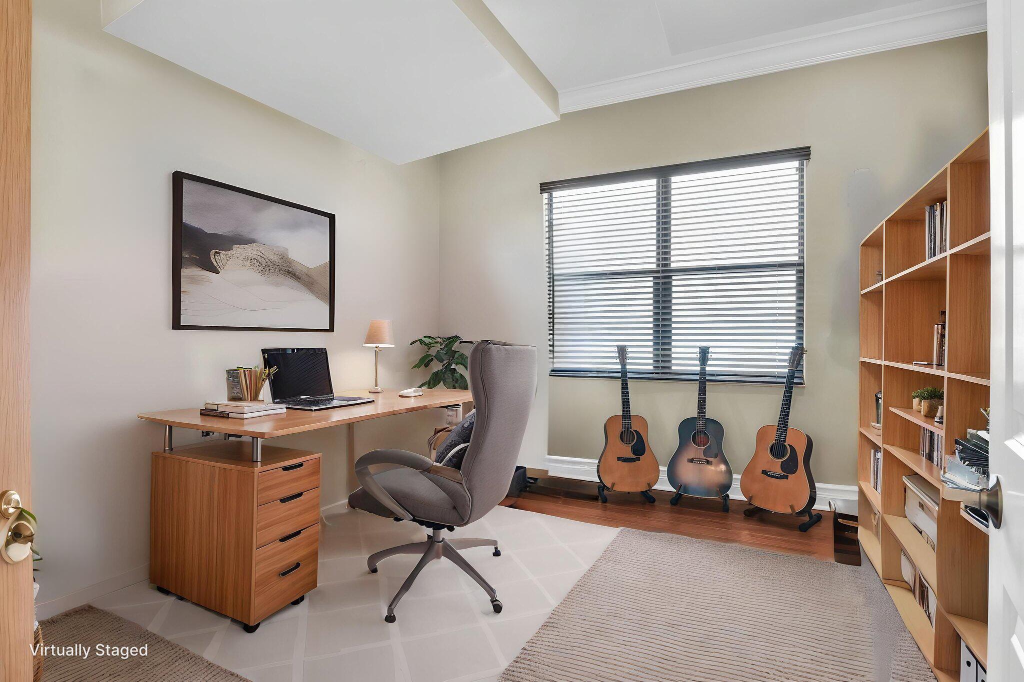 9577 Eden Roc Court Delray Beach, FL 33446 - Photo 17 of 53 a view of a workspace with furniture and a window