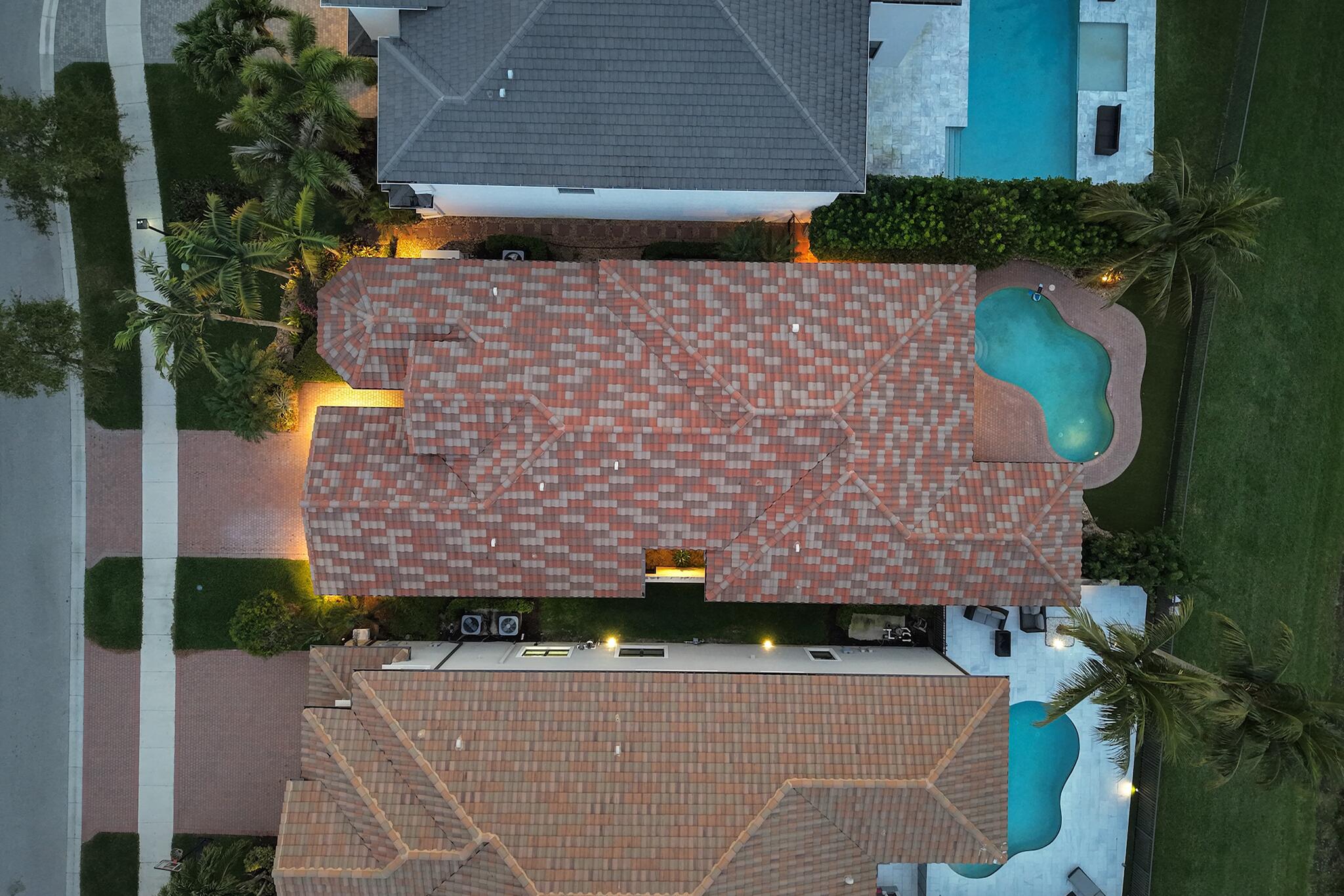 9577 Eden Roc Court Delray Beach, FL 33446 - Photo 25 of 53 an aerial view of a house with a yard