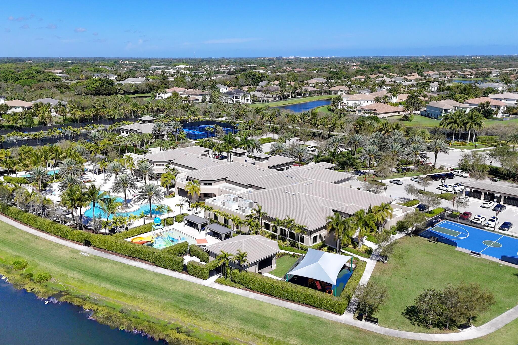 9577 Eden Roc Court Delray Beach, FL 33446 - Photo 27 of 53 an aerial view of residential houses with outdoor space