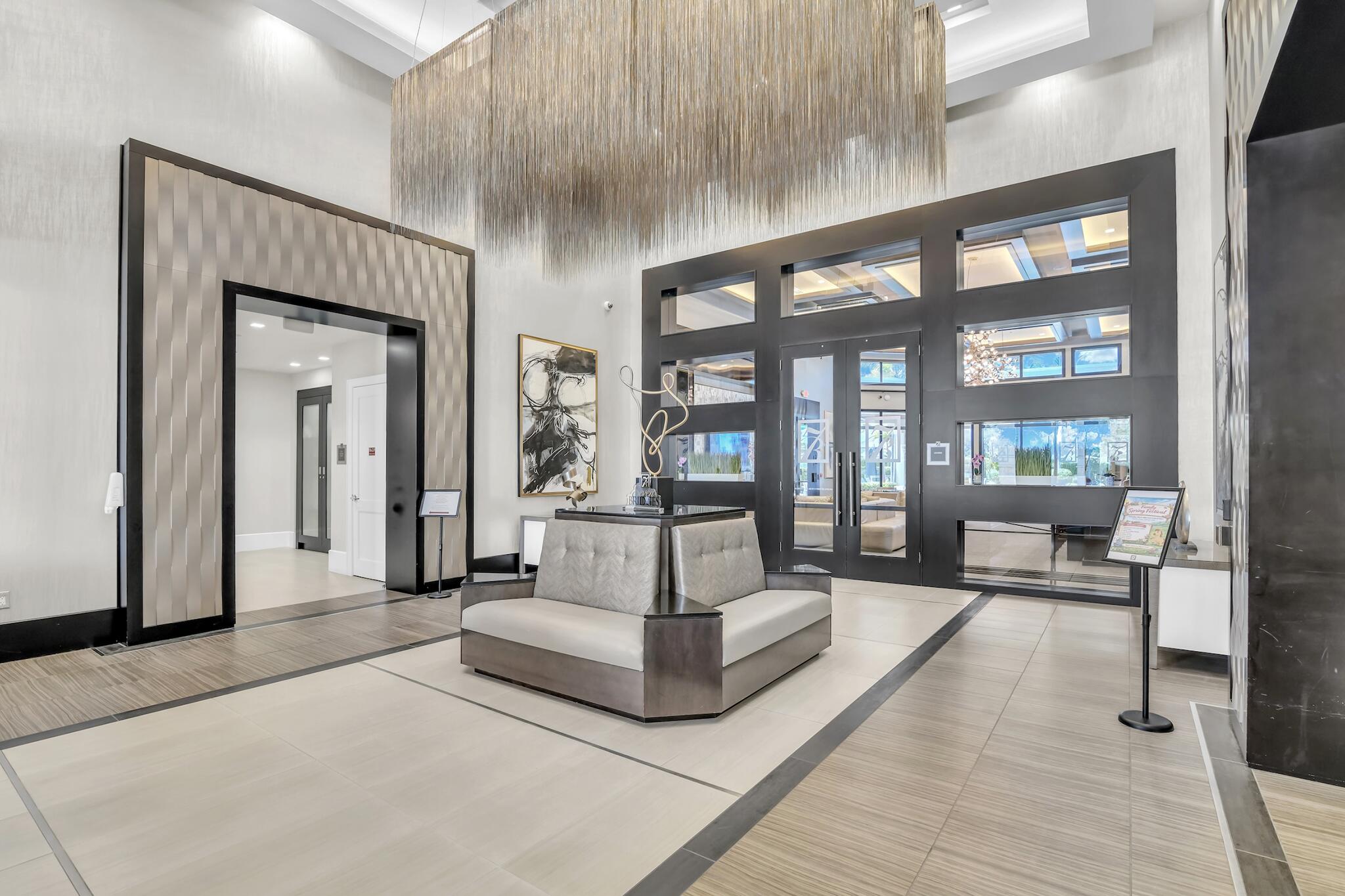 9577 Eden Roc Court Delray Beach, FL 33446 - Photo 35 of 53 Seven Bridges Clubhouse Entry