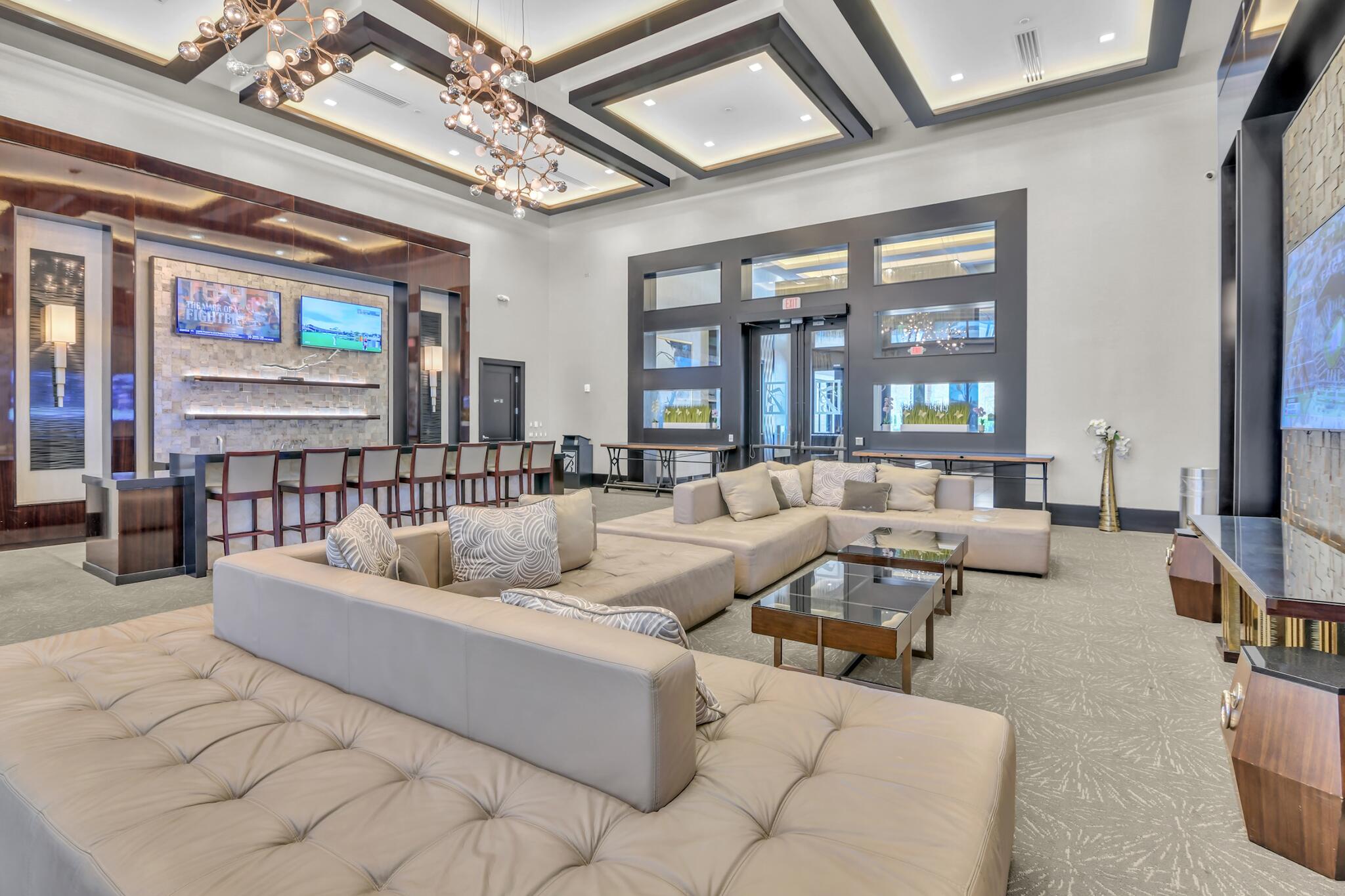 9577 Eden Roc Court Delray Beach, FL 33446 - Photo 37 of 53 a living room with furniture and a large window