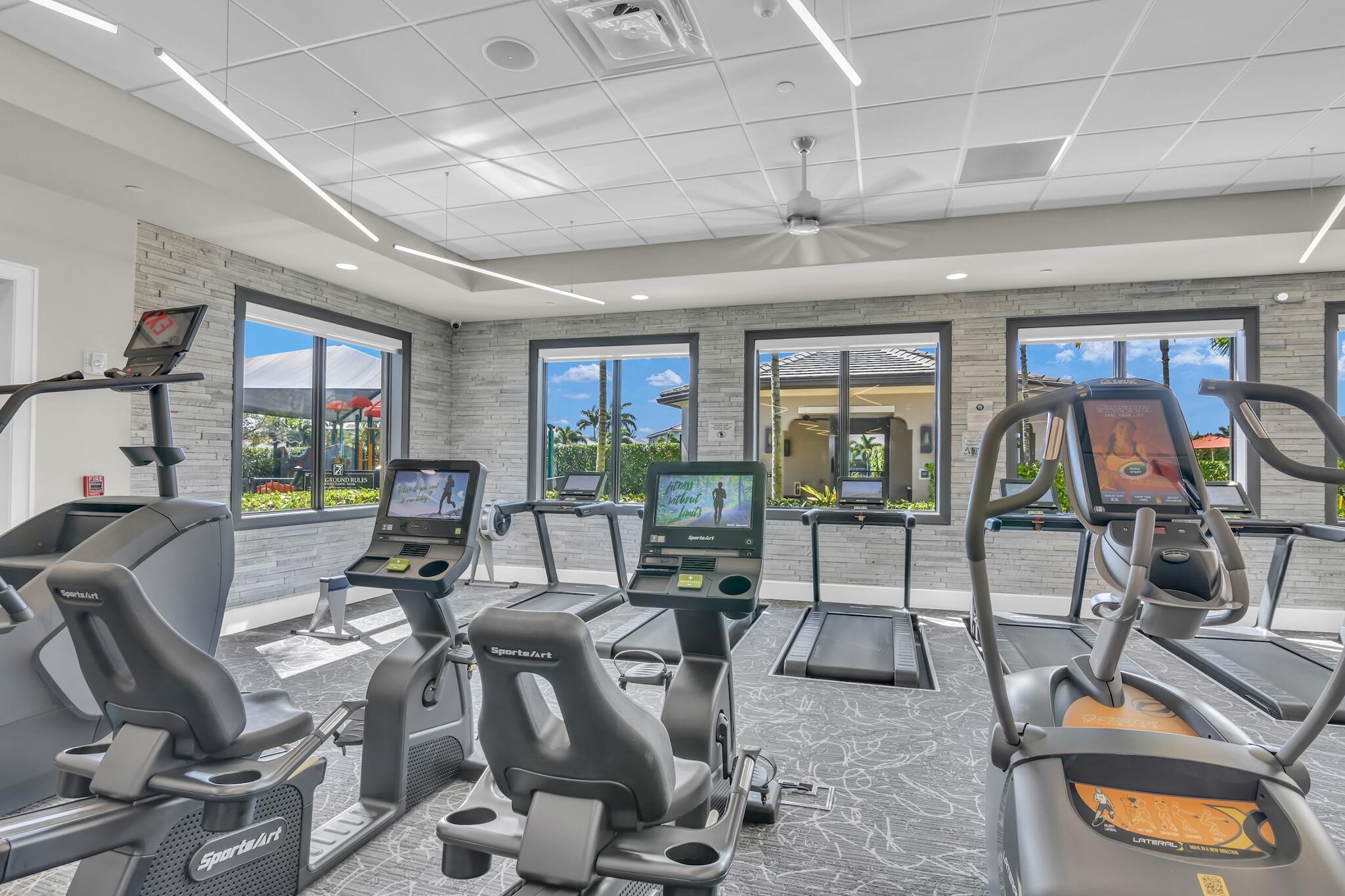 9577 Eden Roc Court Delray Beach, FL 33446 - Photo 43 of 53 a view of a room with gym equipment