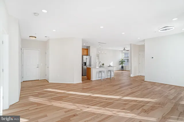 a view of a kitchen with a sink and cabinets