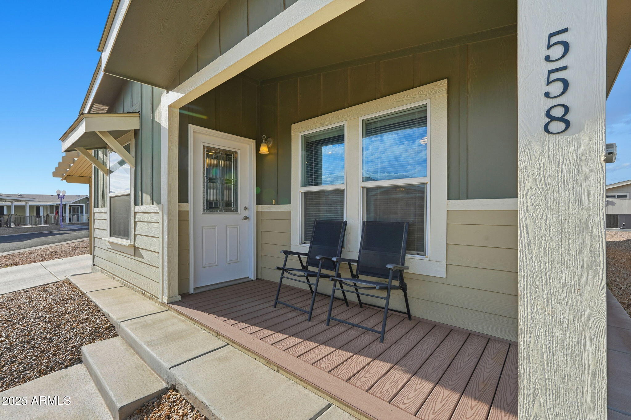 8865 East Baseline Road, Unit 558 Mesa, AZ 85209 - Photo 10 of 54 a porch with seating space