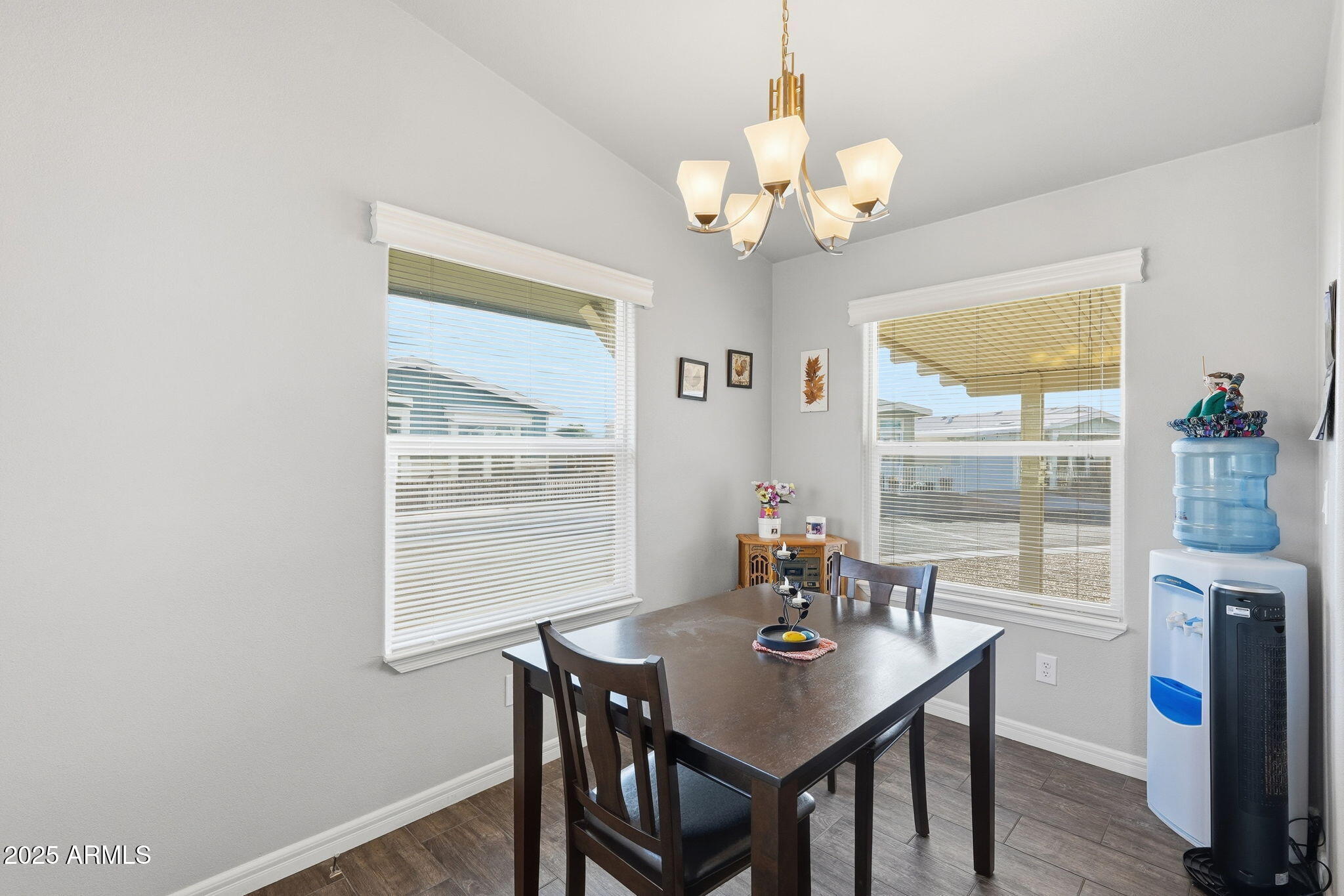 8865 East Baseline Road, Unit 558 Mesa, AZ 85209 - Photo 21 of 54 a view of a dining room with furniture window and outside view