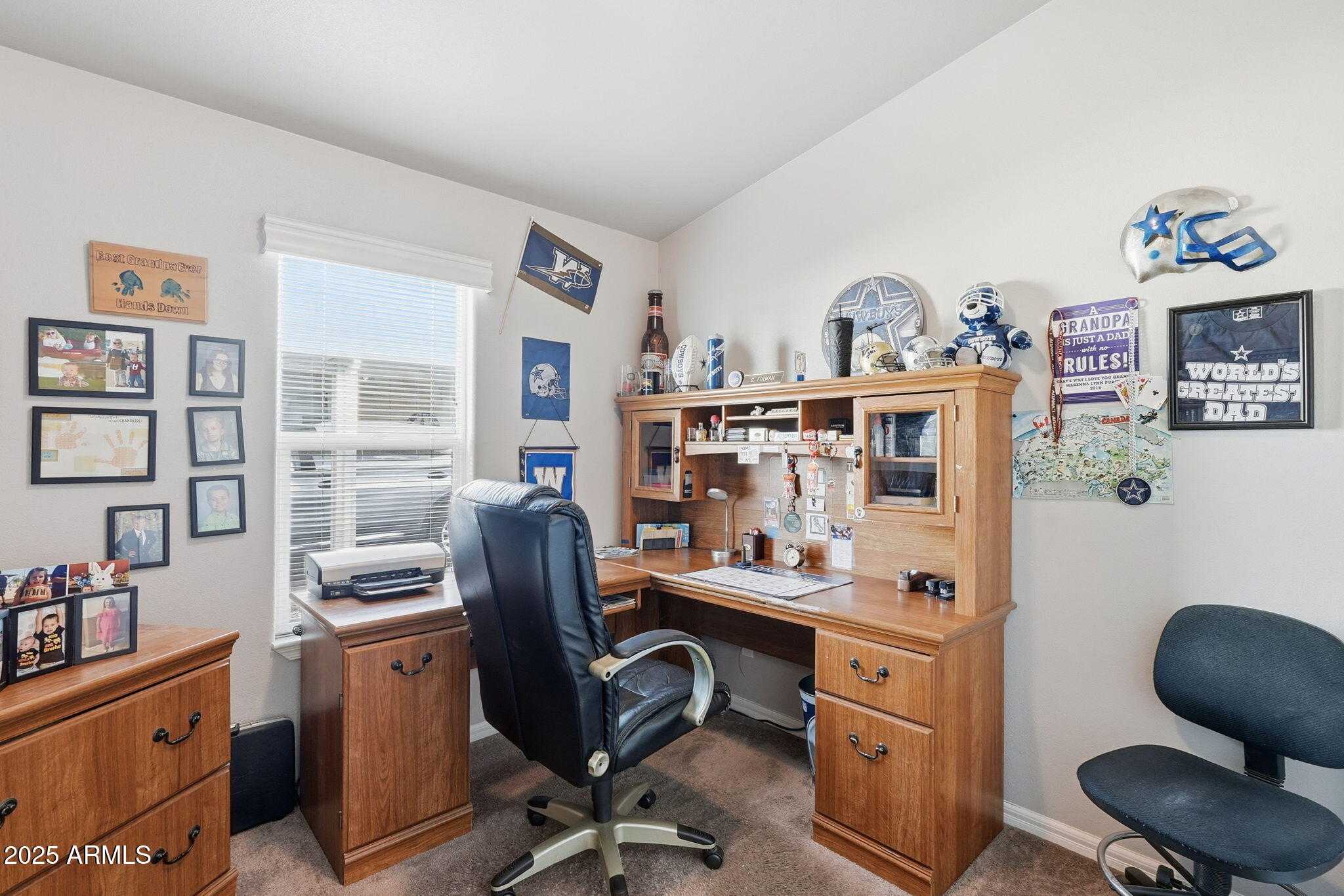 8865 East Baseline Road, Unit 558 Mesa, AZ 85209 - Photo 23 of 54 a view of a workspace with furniture and a window