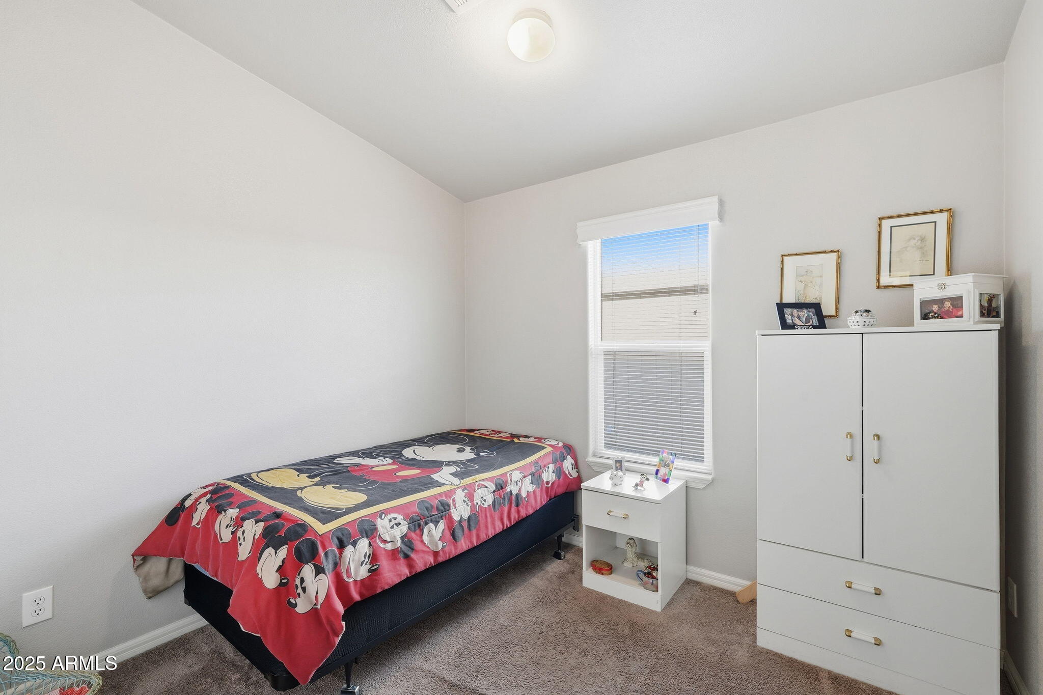 8865 East Baseline Road, Unit 558 Mesa, AZ 85209 - Photo 24 of 54 a bedroom with a bed and a window