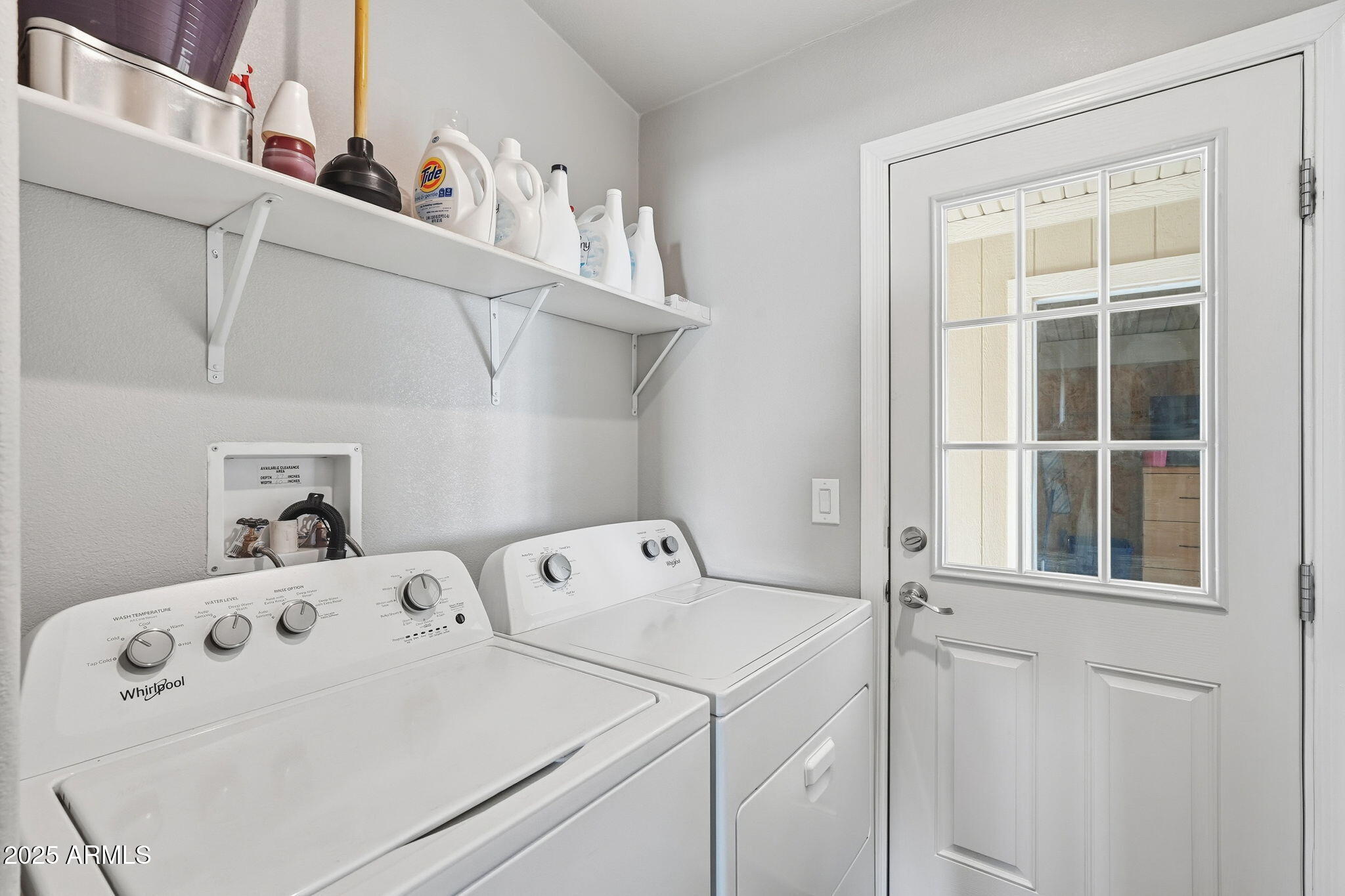 8865 East Baseline Road, Unit 558 Mesa, AZ 85209 - Photo 33 of 54 a utility room with dryer and washer