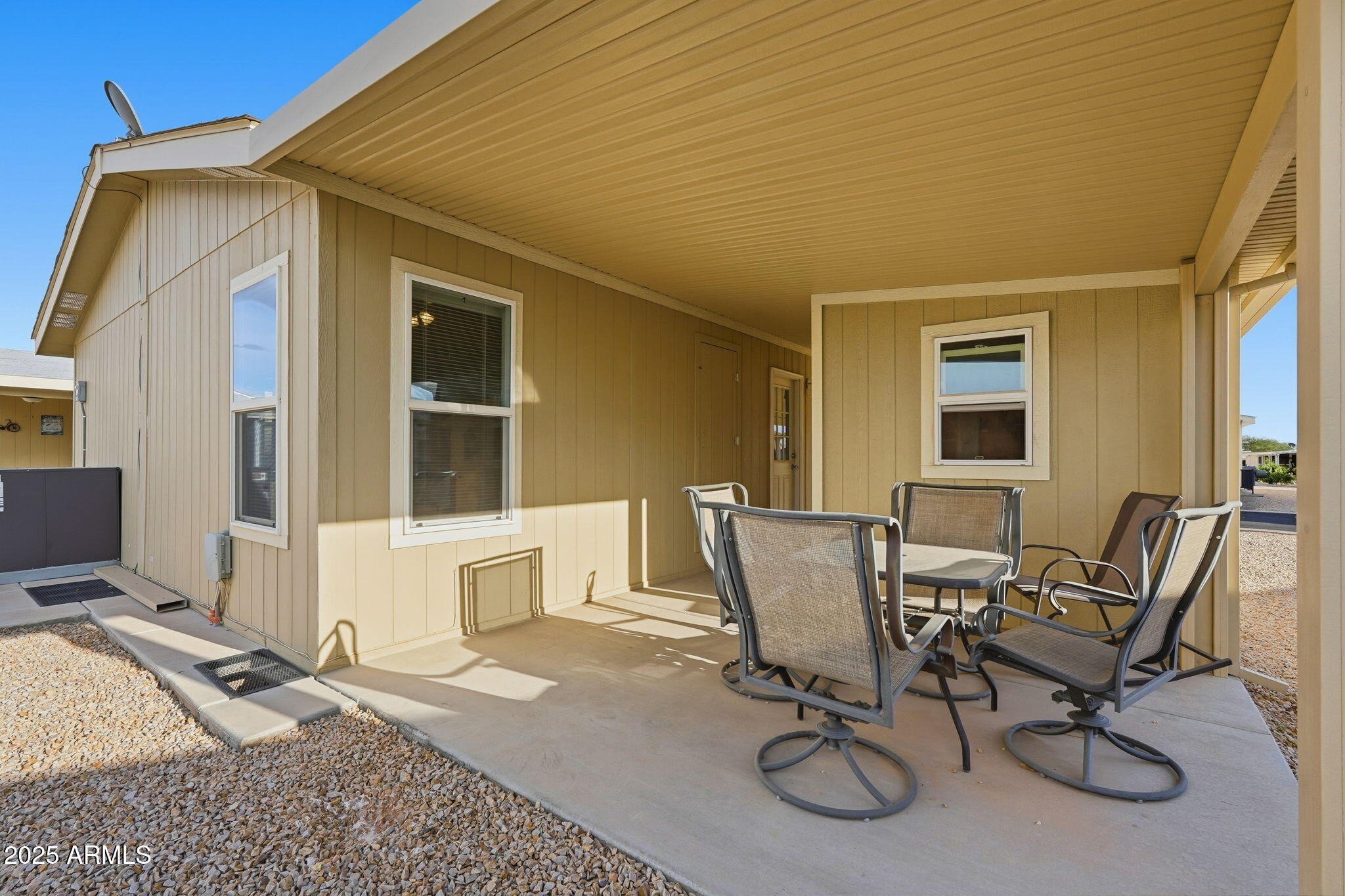 8865 East Baseline Road, Unit 558 Mesa, AZ 85209 - Photo 35 of 54 a view of a workspace with furniture and a window