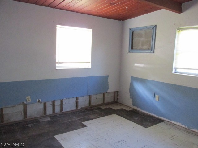 4509 Luckett Road Fort Myers, FL 33905 - Photo 6 of 16 a view of an empty room with a window