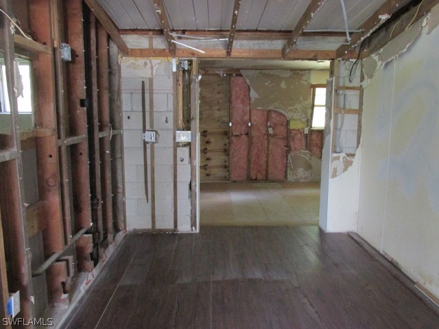 4509 Luckett Road Fort Myers, FL 33905 - Photo 7 of 16 a view of a hallway with wooden shelves