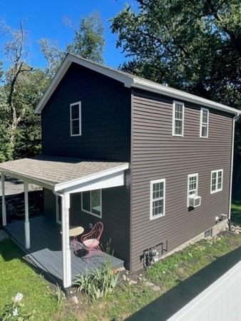 47 Bow Street Saugus, MA 01906 - Photo 1 of 31 a view of house with backyard