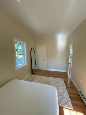 47 Bow Street Saugus, MA 01906 - Photo 14 of 31 a bedroom with a bed and a window