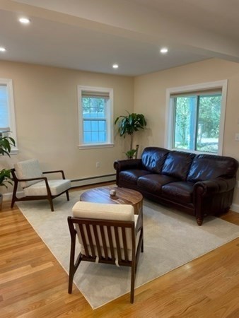 47 Bow Street Saugus, MA 01906 - Photo 18 of 31 a living room with furniture and a potted plant