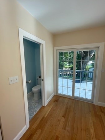 47 Bow Street Saugus, MA 01906 - Photo 28 of 31 a view of empty room with wooden floor and fan