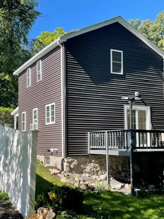 47 Bow Street Saugus, MA 01906 - Photo 3 of 31 a front view of a house with a yard