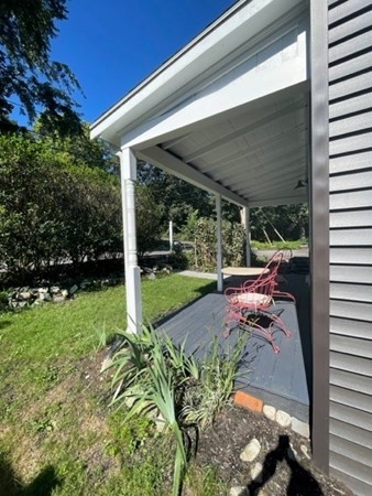 47 Bow Street Saugus, MA 01906 - Photo 5 of 31 a view of a porch with furniture and garden
