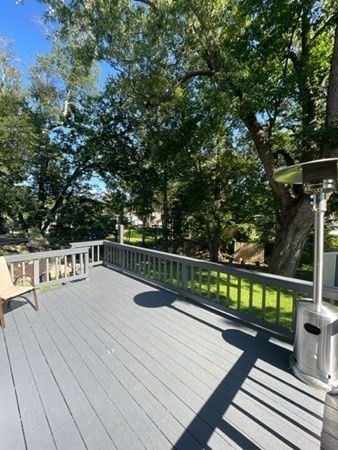 47 Bow Street Saugus, MA 01906 - Photo 6 of 31 a view of balcony with deck and wooden floor