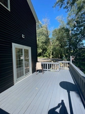47 Bow Street Saugus, MA 01906 - Photo 7 of 31 a view of balcony with wooden floor and seating space