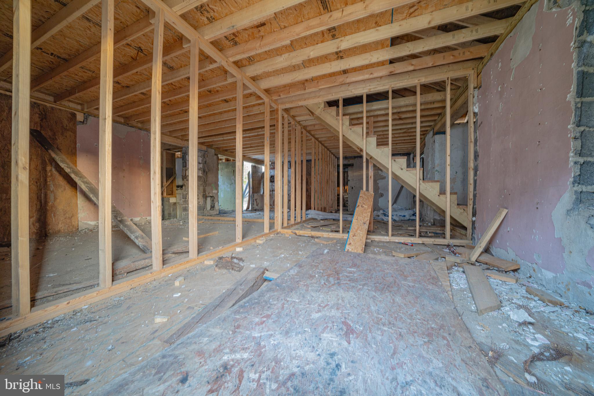 7626 Leonardtown Road Hughesville, MD 20637 - Photo 13 of 18 a view of an empty room with stairs