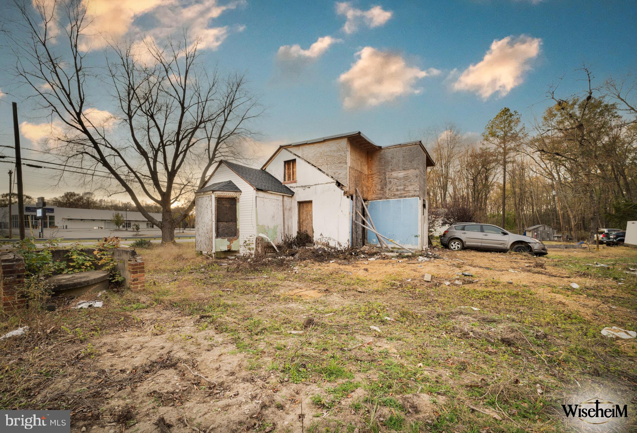 7626 Leonardtown Road Hughesville, MD 20637 - Photo 4 of 18 a view of a house with a yard