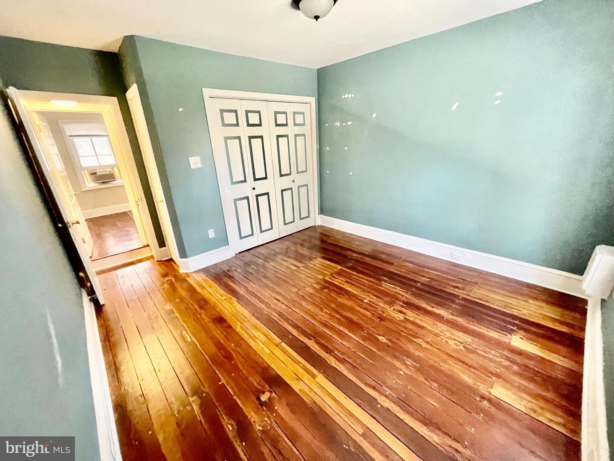 5 Penn Court Philadelphia, PA 19144 - Photo 20 of 23 a view of a room with wooden floor and stairs