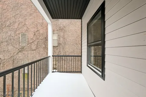 front view of a house with a small yard