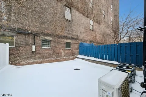 a view of backyard and deck