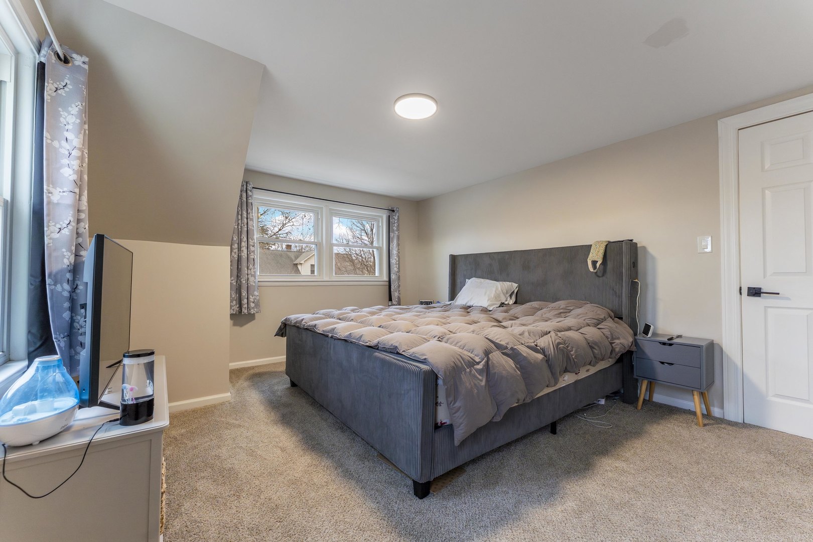 3227 Harrison Avenue Brookfield, IL 60513 - Photo 12 of 21 a bedroom with a bed and large windows