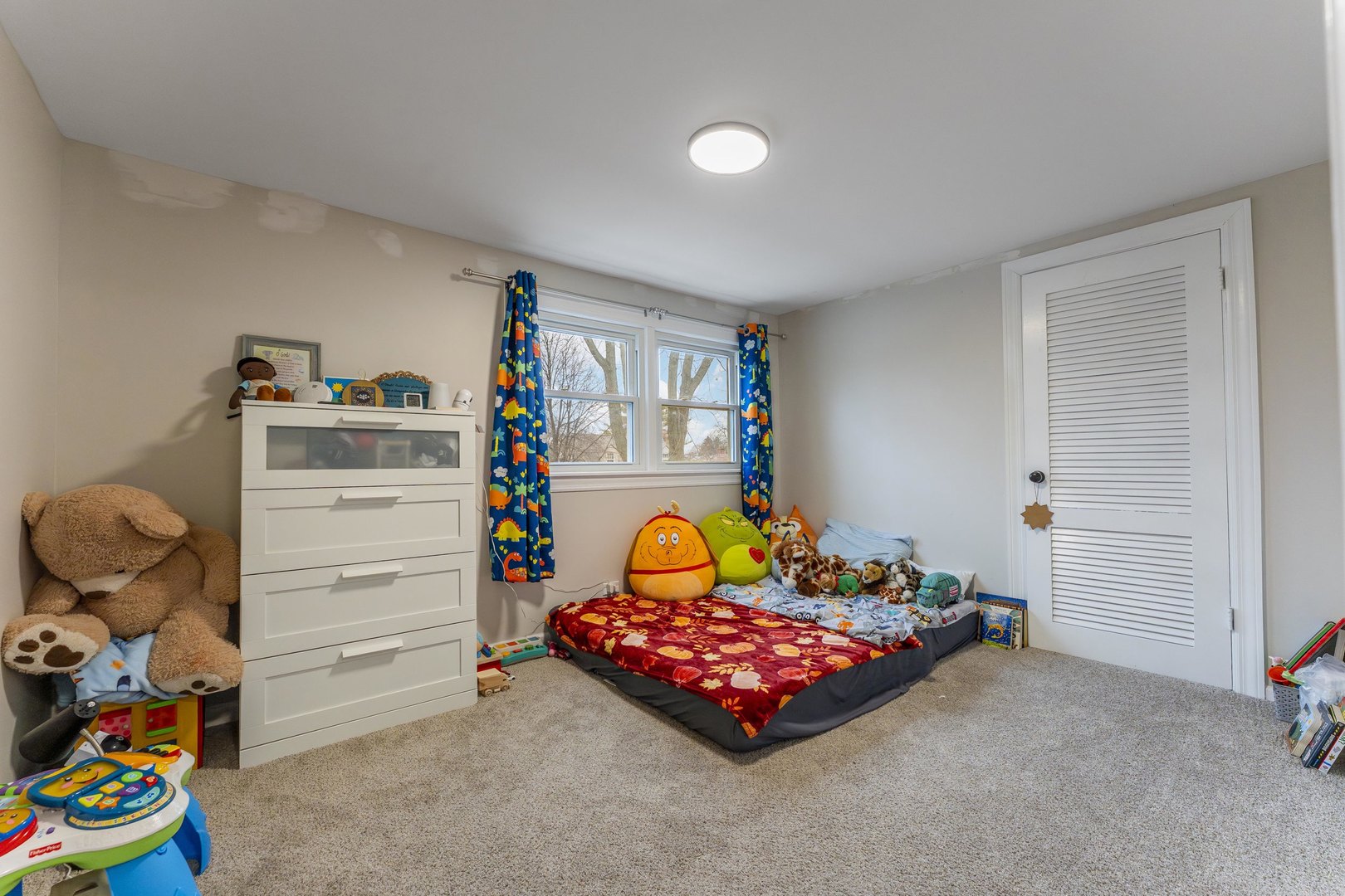 3227 Harrison Avenue Brookfield, IL 60513 - Photo 14 of 21 a bedroom with toys and dresser