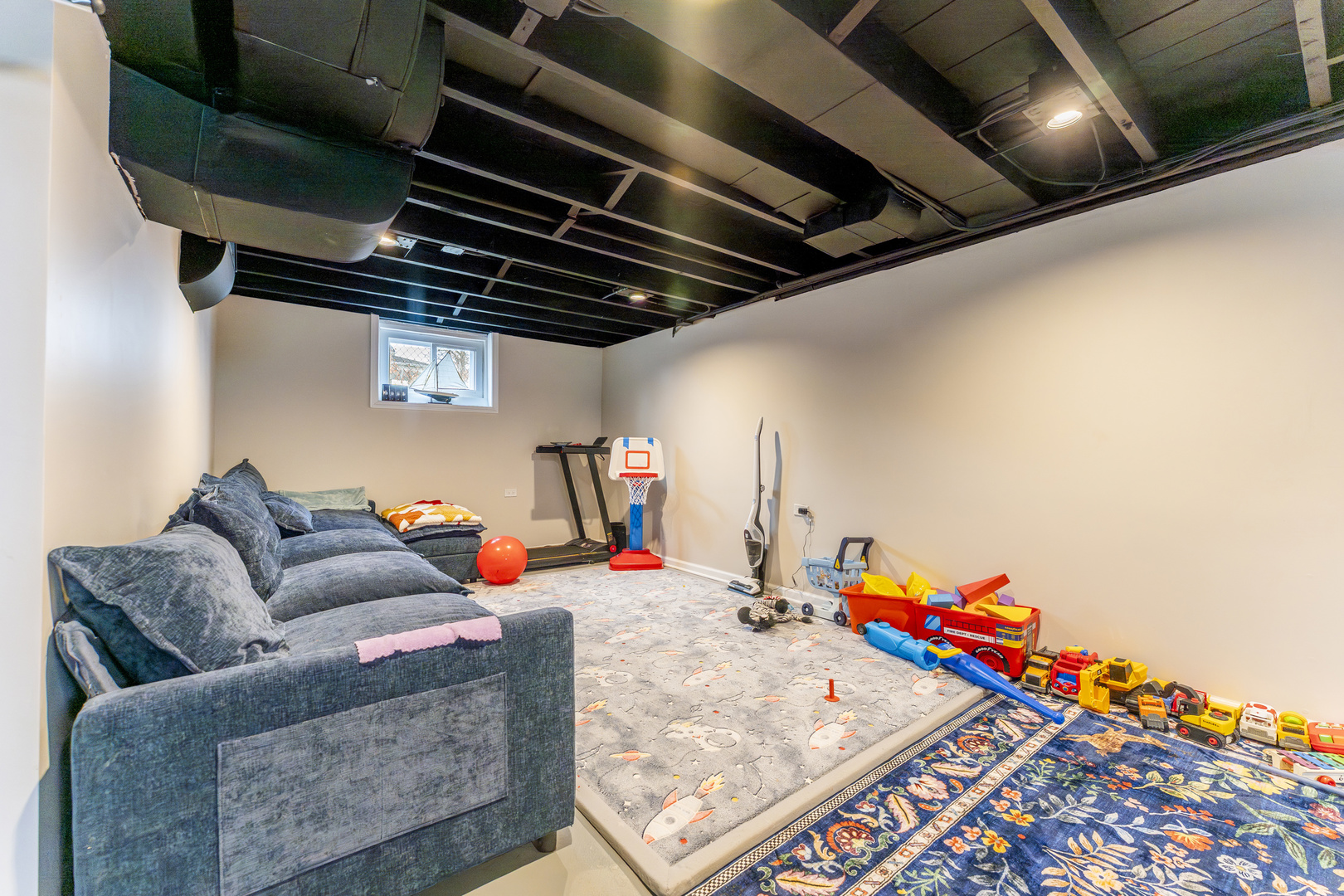 3227 Harrison Avenue Brookfield, IL 60513 - Photo 17 of 21 a bed room with furniture and a projector screen