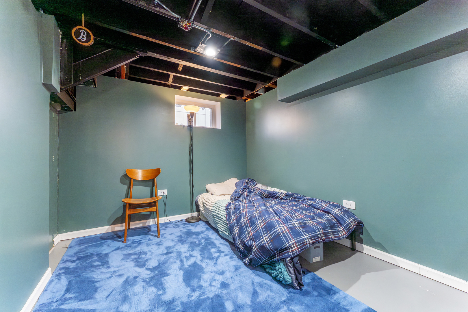 3227 Harrison Avenue Brookfield, IL 60513 - Photo 18 of 21 a bedroom with a bed and a chair