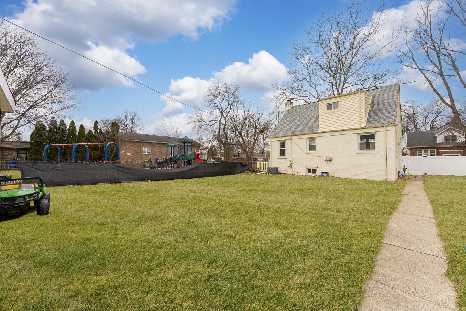 3227 Harrison Avenue Brookfield, IL 60513 - Photo 20 of 21 a front view of house with yard and trees