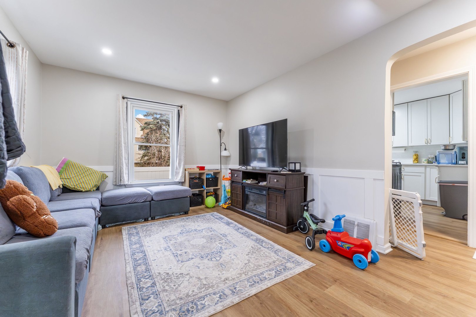 3227 Harrison Avenue Brookfield, IL 60513 - Photo 2 of 21 a living room with furniture and a flat screen tv